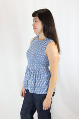 Ruby - Broderie Peplum Top