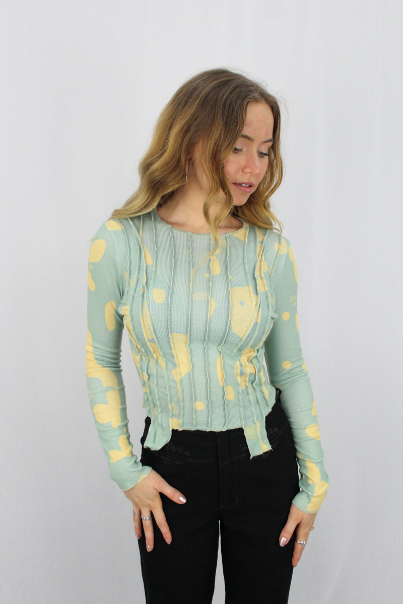 Abstract paneled top